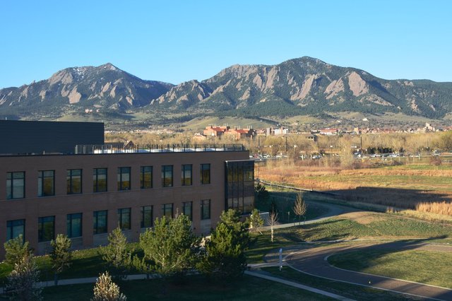 View of Flatirons and courtyard from BCH Foothills