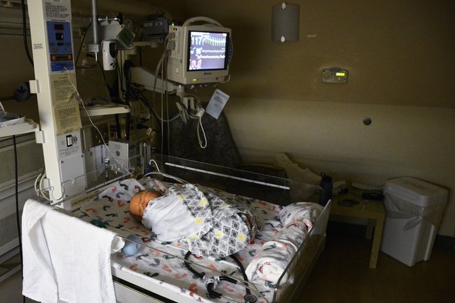 Julian sleeps in the NICU