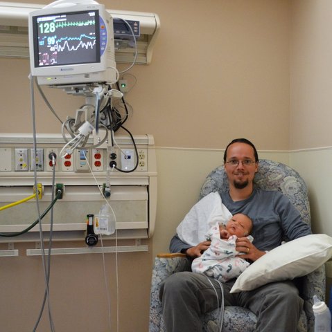 Jaeger holds Julian in the NICU