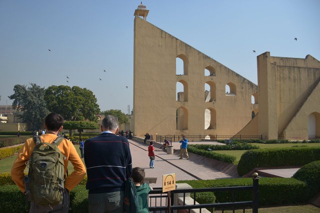 Uncle Willy, Grandpa, and Calvin look at the sundial at Jantar Mantar