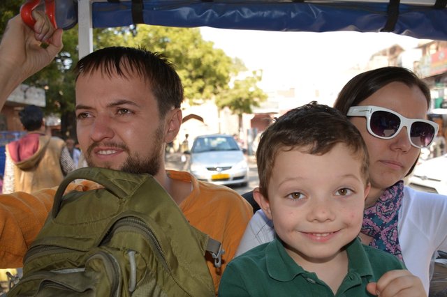 Uncle Willy, Calvin, and Aunt Bethany in an electric rickshaw in Jaipur