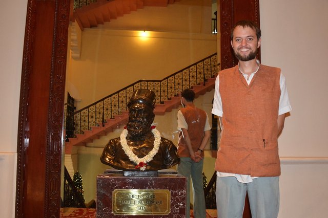 Willy with a bust of Jamsetji Tata at the Taj Mahal Palace