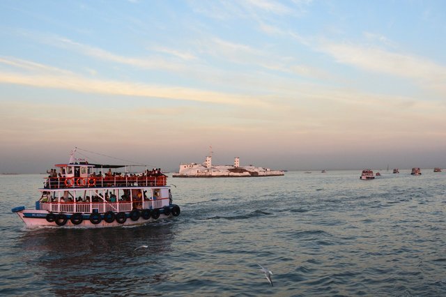 Floatilla of ferries return from Elephanta Island