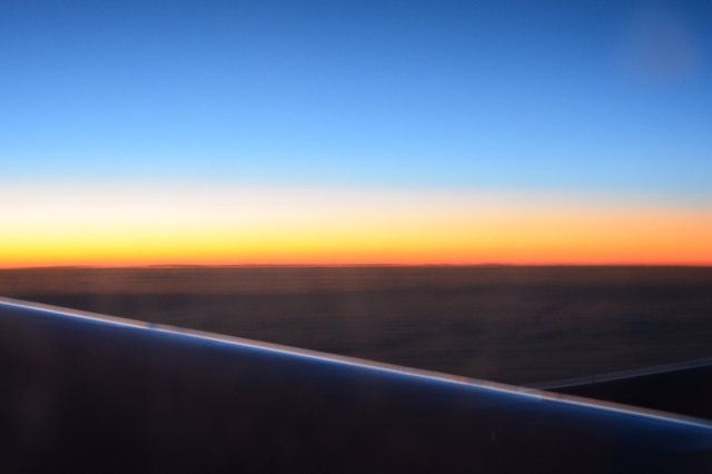 Pre-dawn light somewhere over the Atlantic Ocean