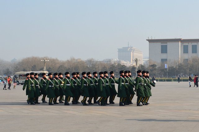 People's Armed Police march in Tiananmen Square