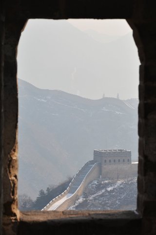 Guard tower on the Great Wall of China viewed from another tower's windows