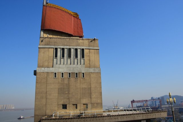 Dramatic tower on the eastern approach to the Yangzee River Bridge