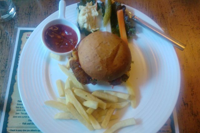 Veggie burger and fries at The Barking Deer in Mumbai