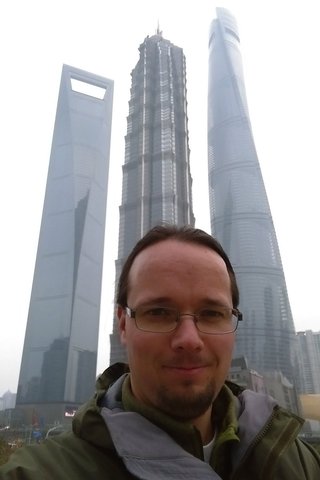 Jaeger with the Shanghai World Financial Center, the Jin Mao Tower, and the Shangai Tower