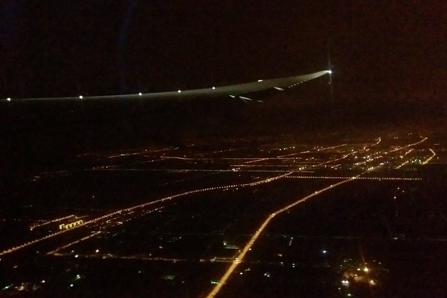 787 wing taking off from Shanghai Pudong International Airport