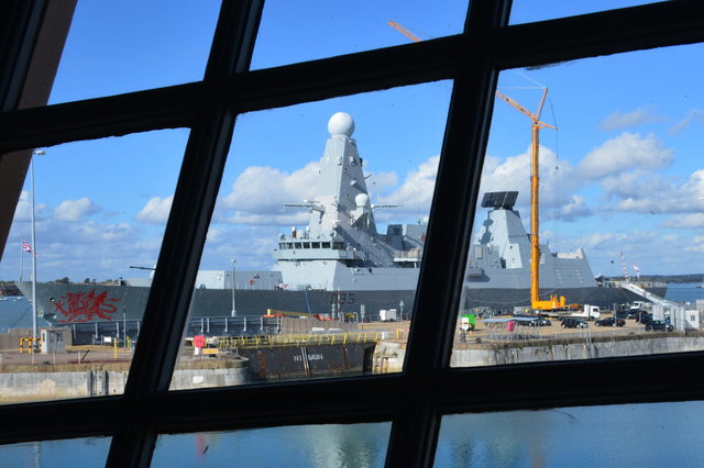 HMS Dragon framed in the stern windows on HMS Victory