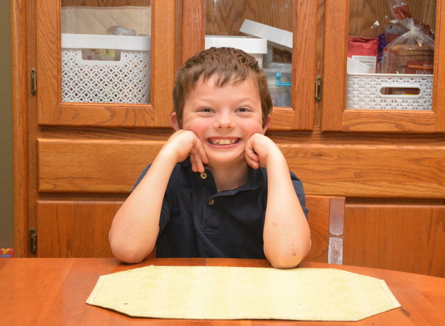 Calvin waits for his birthday cake