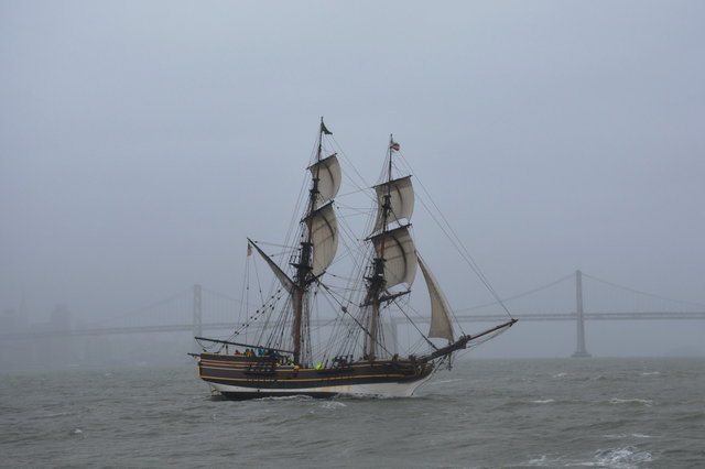 Lady Washington sailing in front of the Bay Bridge