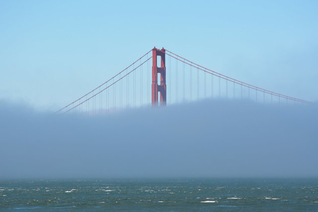 Golden Gate Bridge tower in fog