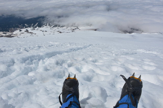 Jaeger's boots and crampons descending Mount Hood