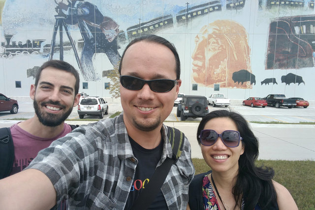 Yannis, Jaeger, and Yang at the data center mural