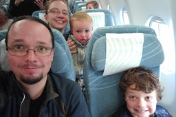 Jaeger, Kiesa, Julian, and Calvin on Finnair flight 12 to Helsinki