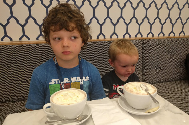 Calvin and Julian drink hot chocolate at Worldcon