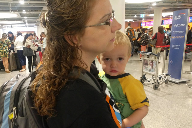 Kiesa and Julian queue to check in at Copenhagen Airport