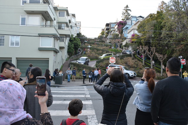 Bethany and Calvin join tourists photographing Lombard Street