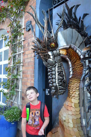 Calvin is less impressed by the dragon on the door than he should be