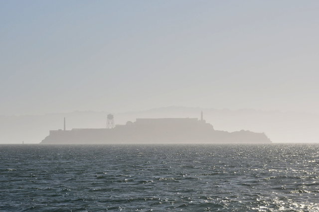 Alcatraz lurking in the morning haze on San Francisco Bay