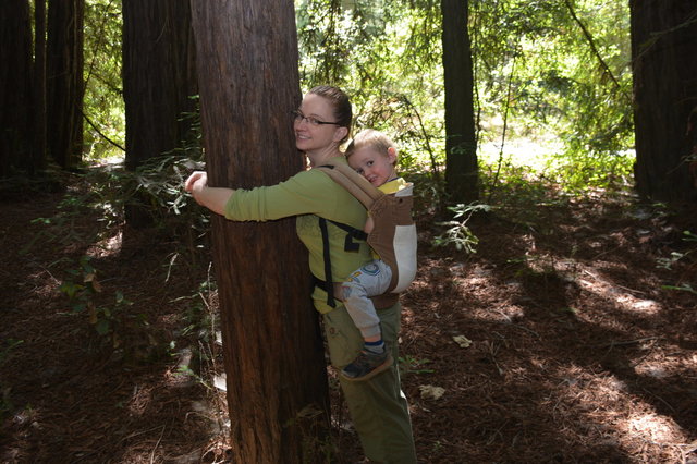 Kiesa and Julian hug a tree