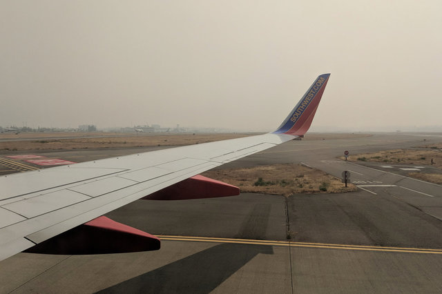 Wildfire haze on the ground at SEA