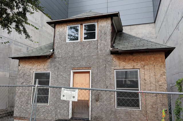 Edith Macefield House surrounded by buildings in Ballard