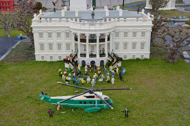 Orange-haired figure in front of the White House in Miniland