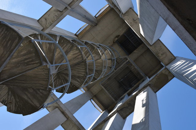 Looking up the spiral staircase at the clocktower at the Royal British Columbia Museum