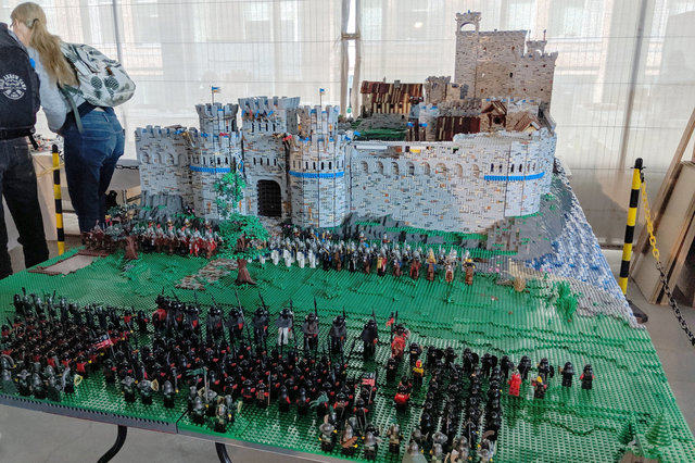 Minifig armies face off in front of a Lego castle