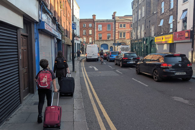 Calvin and Kiesa walk down Meath St in Dublin