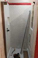 Shower door half-installed