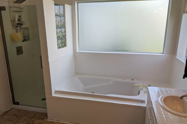 Refinished bathtub tile in master bath
