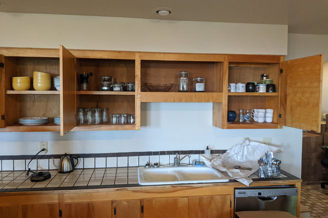 Unpacking the kitchen shelves