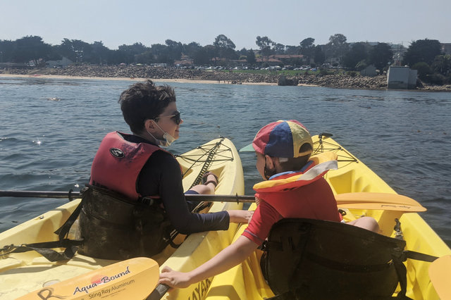 Calvin and Julian on kayaks in Monterey Bay