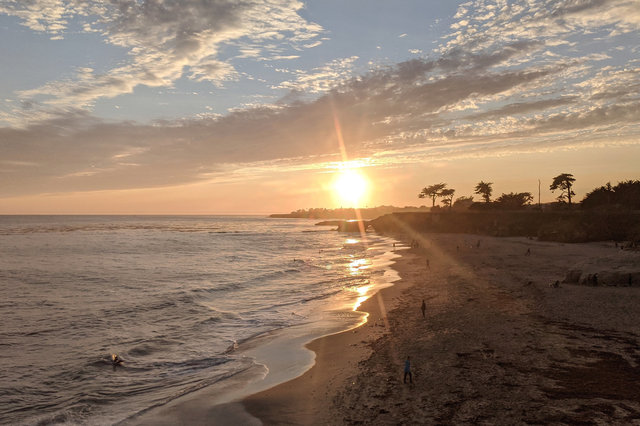 Sun sets over Lighthouse Point Beach