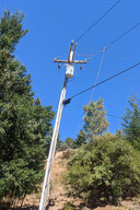 Power lines grounded for tree trimming