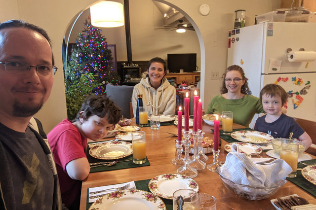 Jaeger, Calvin, Sharon, Kiesa, and Julian sit down to Christmas dinner