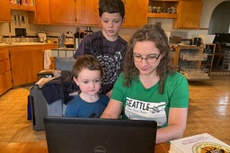 Julian, Calvin, and Kiesa consult on birthday cakes