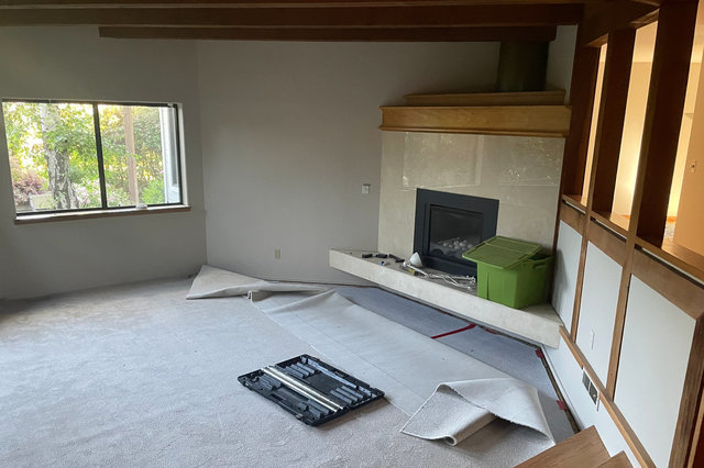 Carpet install in progress in the living room