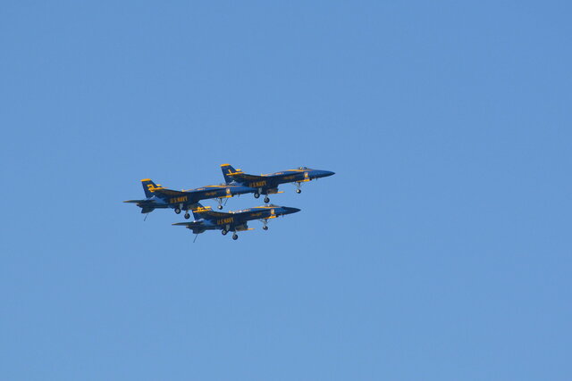 Blue Angels fly in formation with landing gear deployed