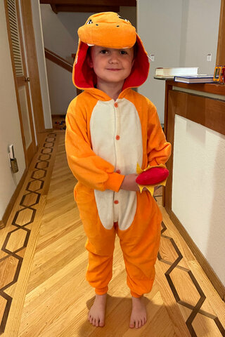 Julian dressed as Charmander