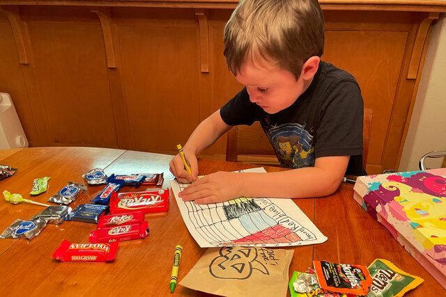 Julian creates a bar graph to visualize his Halloween candy