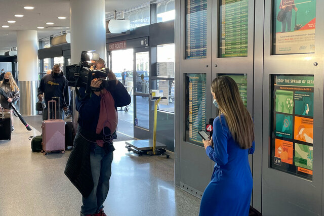 News crew at Oakland Airport