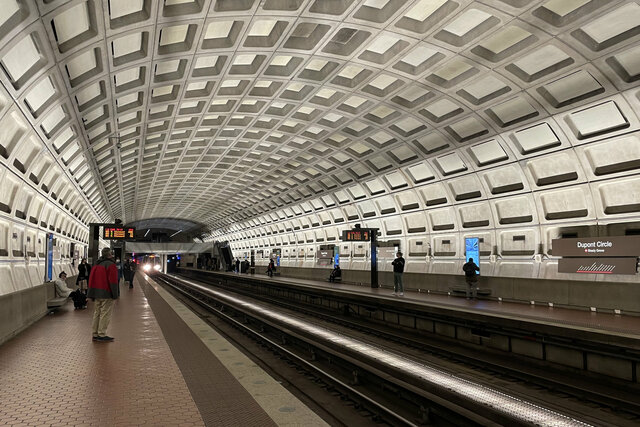 Train arriving into Dupont Circle metro station