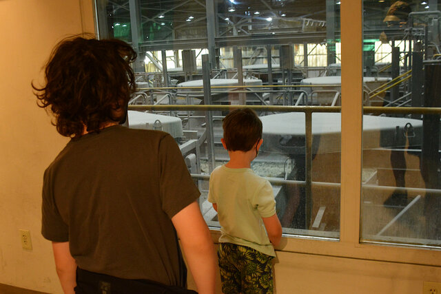 Calvin and Julian watch the copper settling ponds in the south mill