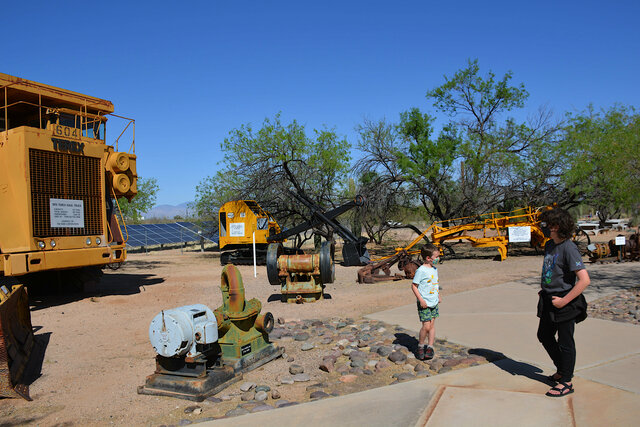 Julian and Calvin with old mining equipment