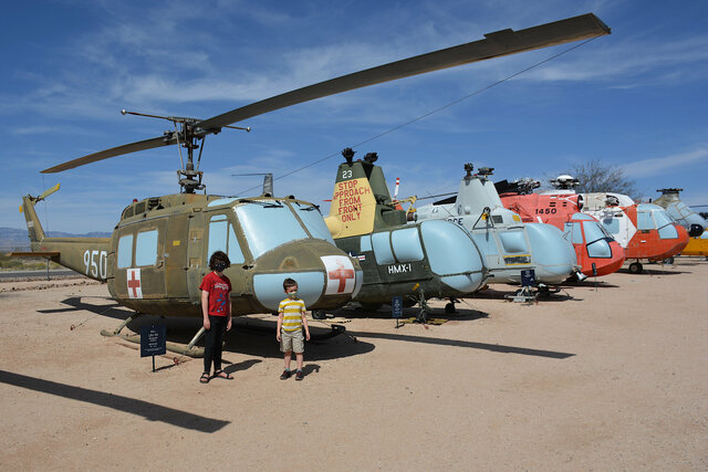 Calvin and Julian with a UH-1 Huey